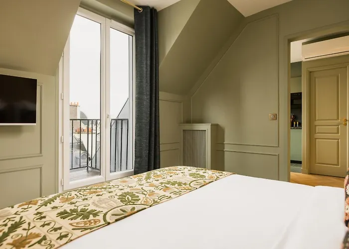 Above The Rooftops Eiffel View *